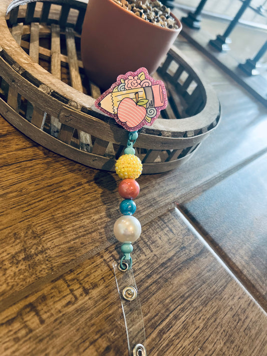 Pink Pencil/Apple Badge Reel