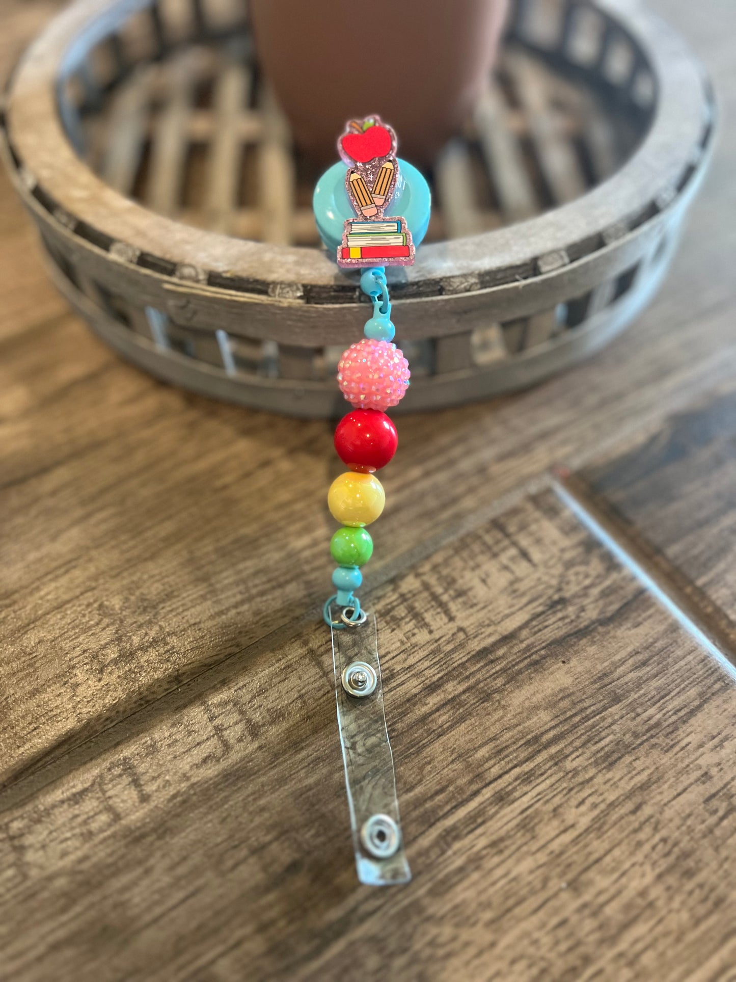 Apple Pencil Books Badge Reel
