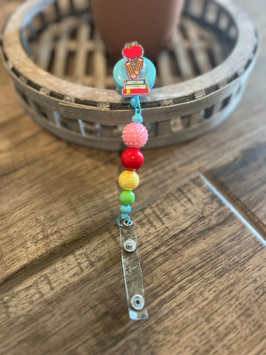 Apple Pencil Books Badge Reel