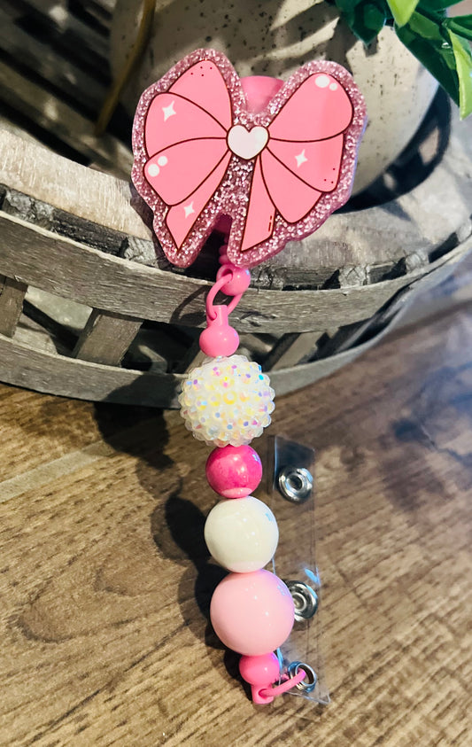 “Bow” Badge Reel 1