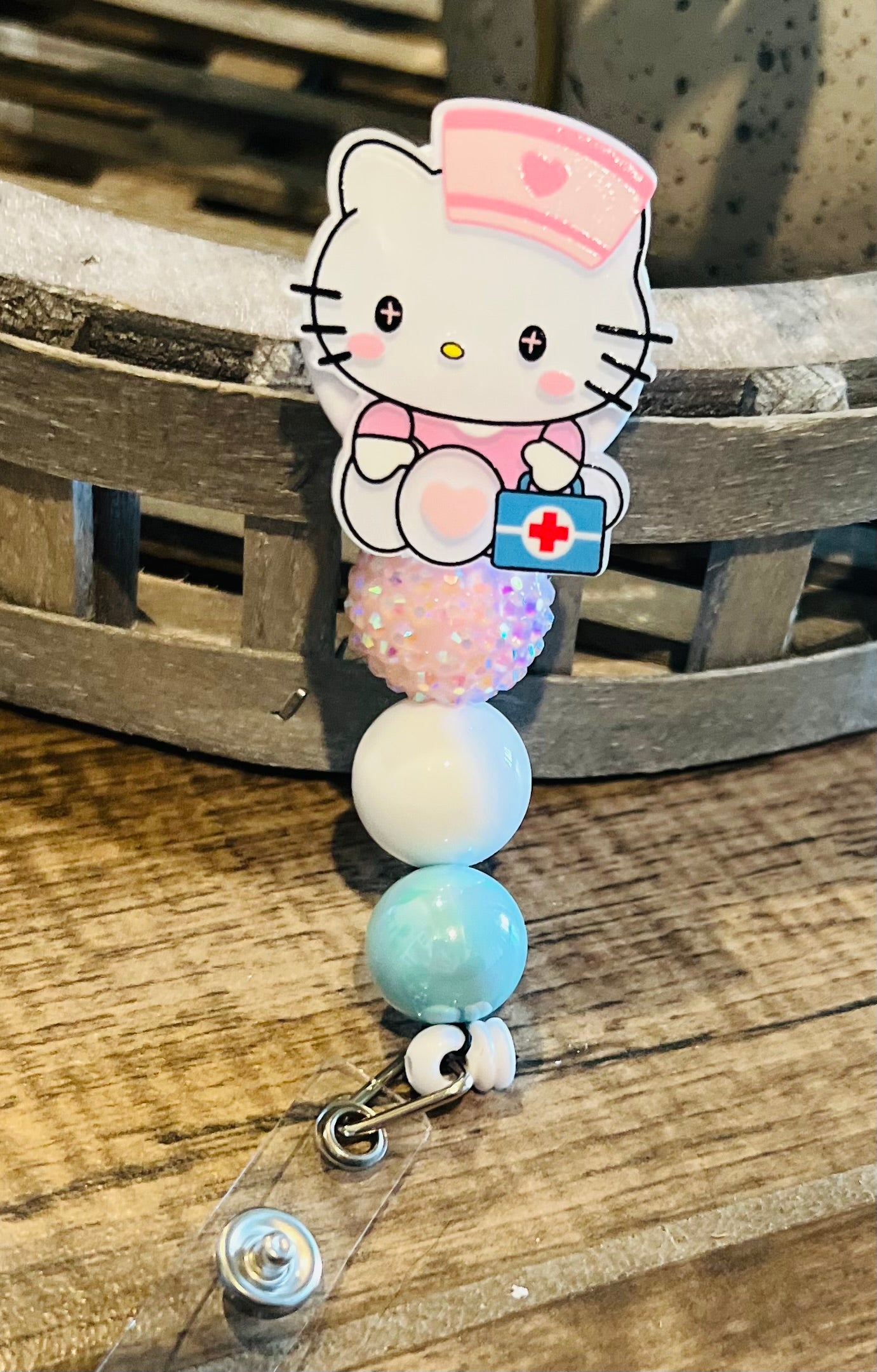 “H Kitty” Badge Reel